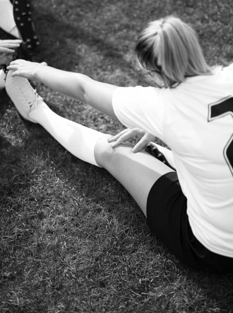 Soccer player stretching